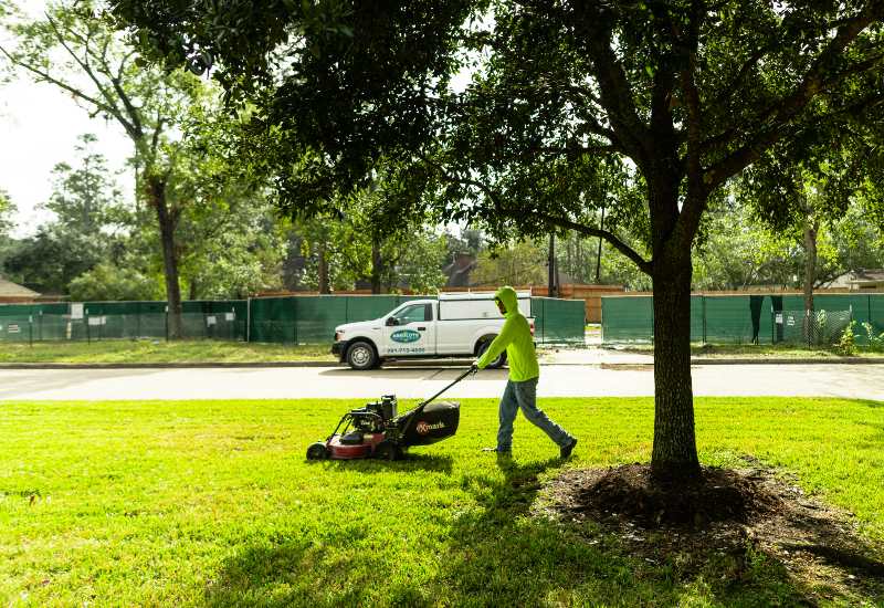 The team member is offering residential lawn mowing services in Houston, TX